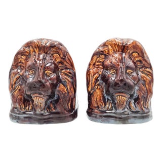 Rockingham Treacle Brown Glazed Lion Portraits, a Pair For Sale