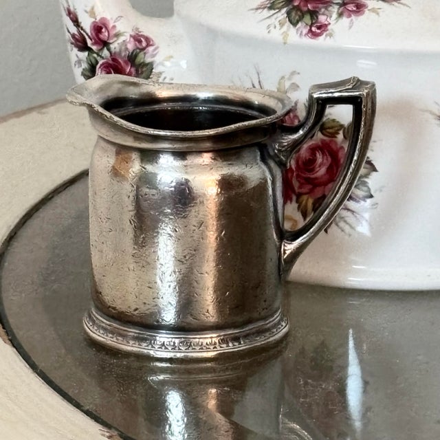 This antique hotel silver creamer was originally commissioned for the historic Roosevelt Hotel in New York City and...