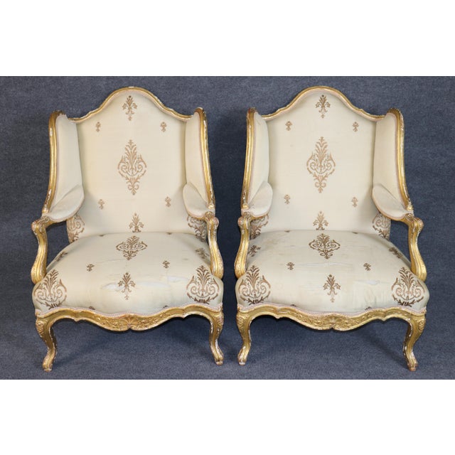 This exceptional and highly unusual pair of French Louis XV-style bergères, dating to the late nineteenth or early...