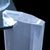 A vintage lucite coffee table in the style of Karl Springer, its thick clear acrylic construction reading as pure,...