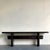 Make a bold architectural statement with this monumental vintage console table, a striking example of 1980s Postmodern...
