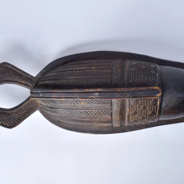 The Mende Sowei Sande Society Helmet Mask of Liberia is a remarkable cultural artifact deeply rooted in the traditions of...