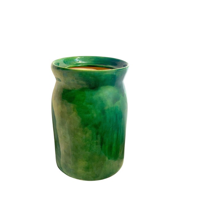 Beautiful rich green color. Glazed terracotta jar signed 1988 Boothe. Perfect for flower arrangements. Adds a touch of...