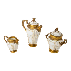 A Three-Piece Paul Canaux & Cie. Partial Gilt Porcelain Coffee Service With Gilt Silver Mounts