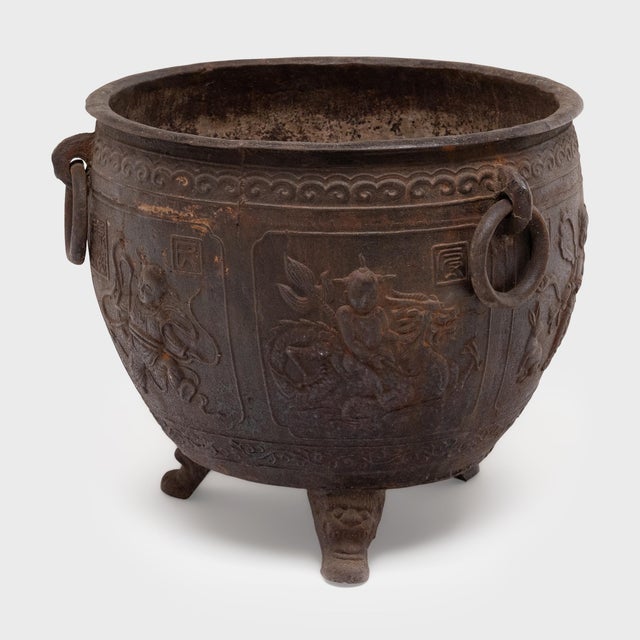 This grand, cast iron planter is modeled after traditional Qing-dynasty vessels used for collecting rain water in case of...