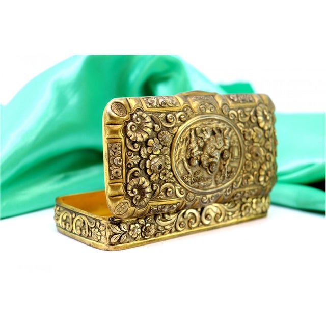 Gilded Silver Box with Chiseled Floral Motifs and Central Card with Children Playing Game, in Good conditions. Designed...