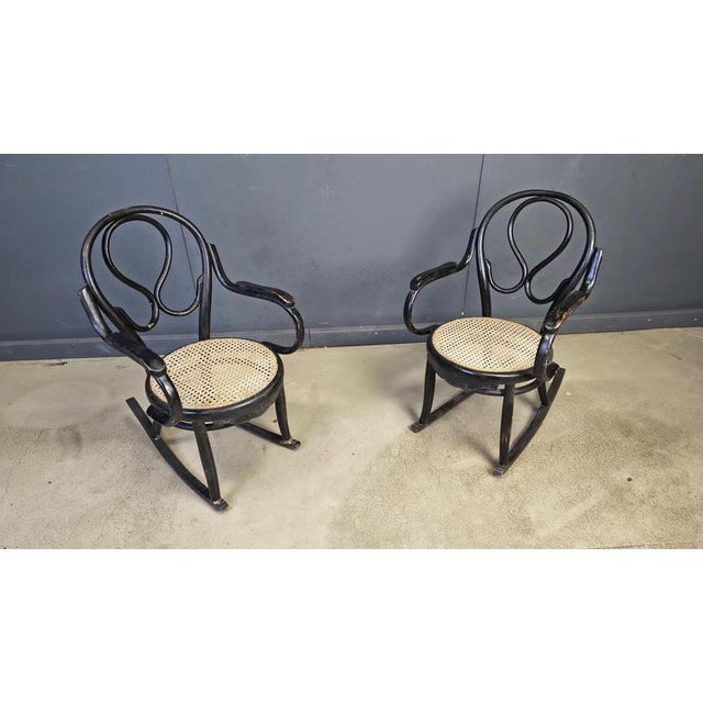 Antique art nouveau rocking chairs attributed to thonet. Made from beautiful untouched ebonized bentwood frames with their...