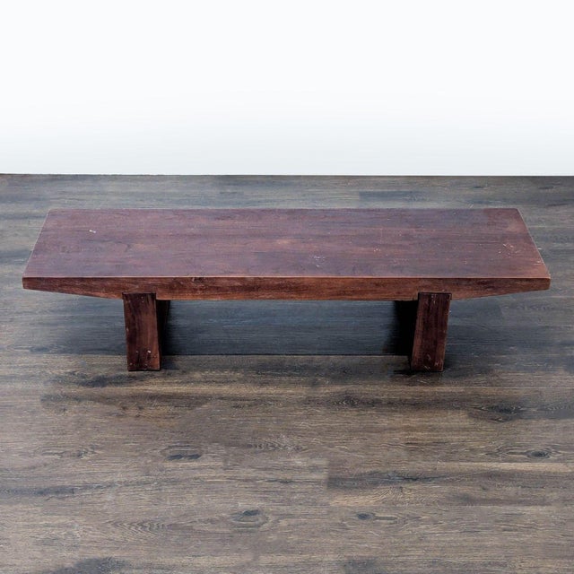 Solid acacia wood, legs have adjustable levelers to adjust to varying floor levels. Brand: West Elm. Original Price: $599....