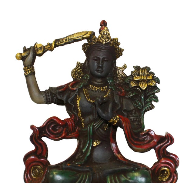 This is a nicely made crystal glass small statue of oriental Chinese Buddha Tibetan Tara . There is a lotus flower around...