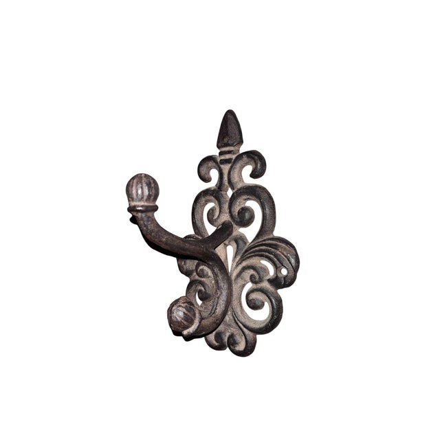 Great decorative wrought iron hanging hook coats, hats, apron, dog leases. Beautiful accent and sturdy piece. Wt is 1 lb 9...