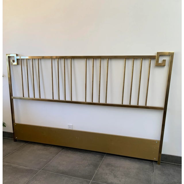 A brass, Greek Key headboard made by MasterCraft around 1970s. A fabulous, Hollywood Regency king size headboard in great...