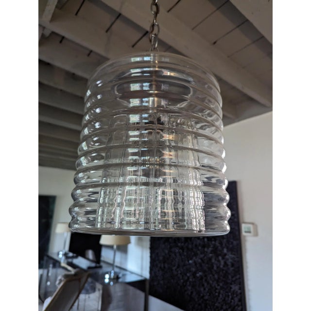 Beautiful blown glass pendant light. Hand blown. Ribbed. Made in Sweden. Works with many design styles.