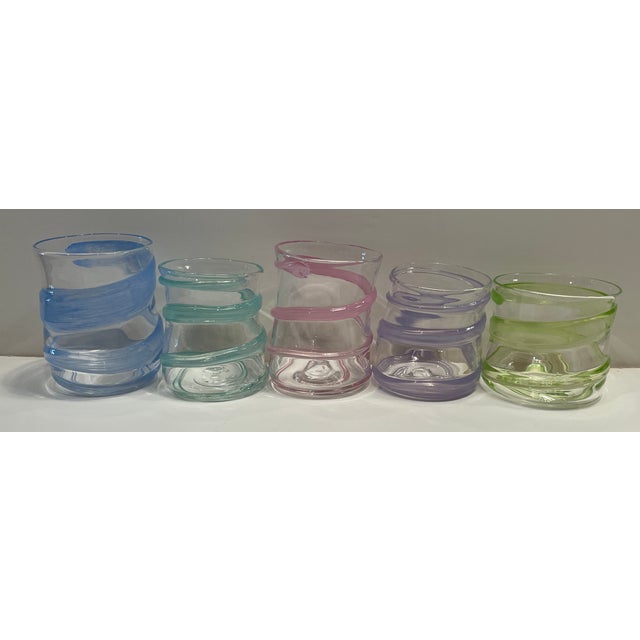 Set of nine blown glass cups.. Some are signed "Arien" and were together in central North Carolina. Each cup is a little...