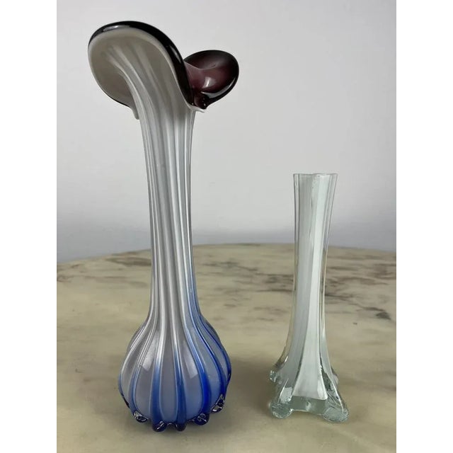 Pair of small Murano vessels. The larger is 29 cm tall and it is 8 cm wide; The smallest is 20 cm tall and 5.5 cm wide....