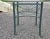 Giacometti style Outdoor Dining Table This Wrought iron table features a 54" glass top and a sturdy square base. The table...