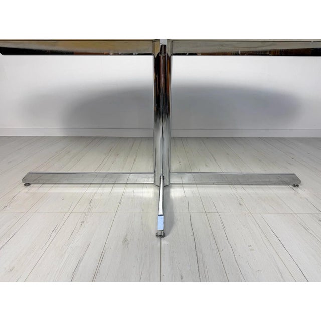 Impressive large oval dining table designed by florence knoll for roche bobois, dating from the 1960s. the table features...