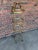 Traditional Vintage Brass Tone Iron Display Shelf With Four Glass Shelves. For Sale - Image 3 of 6