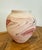 Vintage Large Nemadji Pottery vase. Terra-cotta, rust and a dark brown and black make up the swirl marbled pattern on the...