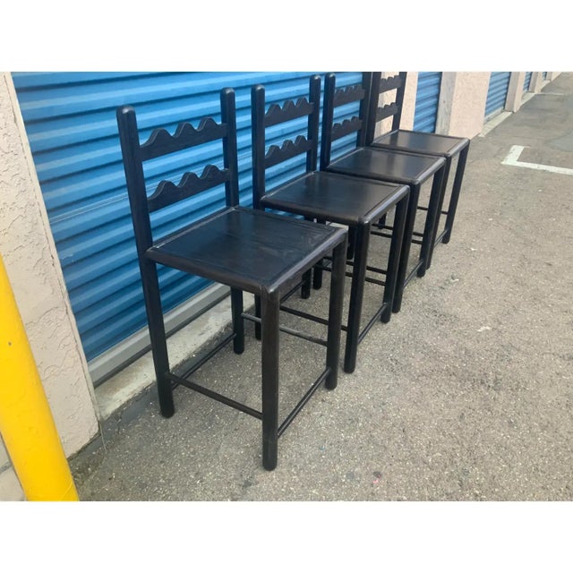 Set of 4 country French solid oak counter stools. Stools are done in a rich dark mocha . The stools were custom made. The...