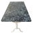 Bistro table from the 1900s, X-shaped legs in cast iron and wrought iron with original gray marble top. from a Parisian...