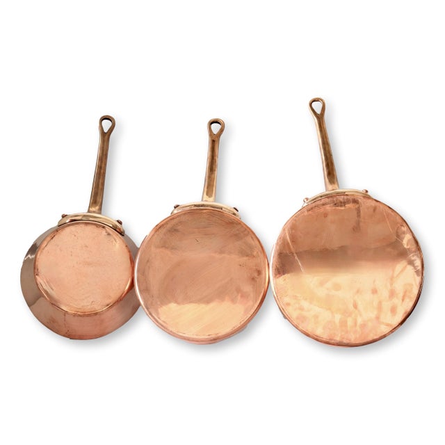 Professional-grade copper cookware set by Helvetia, known for its heavy-duty construction and timeless quality. Crafted of...