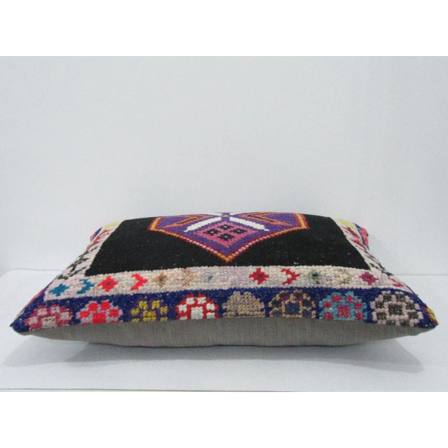 Decorative pillow cover made from a vintage Turkish handknotted rug. Backed with good quality cotton fabric. Pillow...