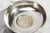 A handsome blend of American silver and mid-century craftsmanship, this circa 1940s sterling silver catchall dish is...
