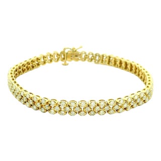 Circa 1990 14k Yellow Gold Three-Row Diamond Bracelet, 7.80 Carats For Sale