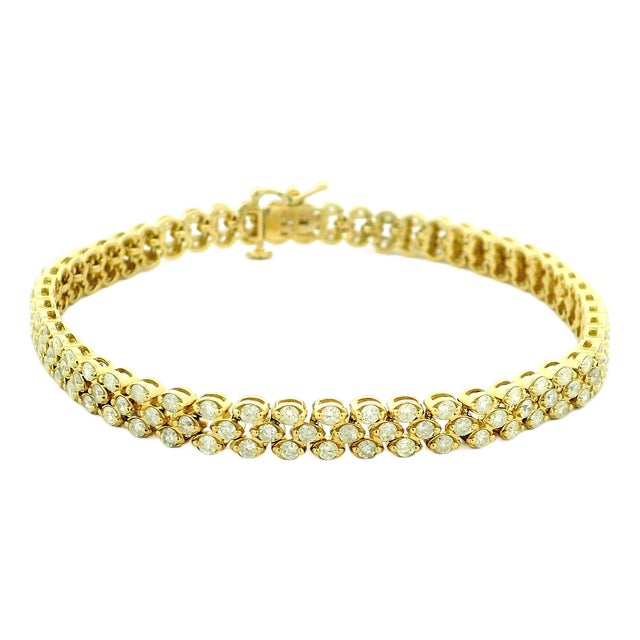 Circa 1990 14k Yellow Gold Three-Row Diamond Bracelet, 7.80 Carats For Sale