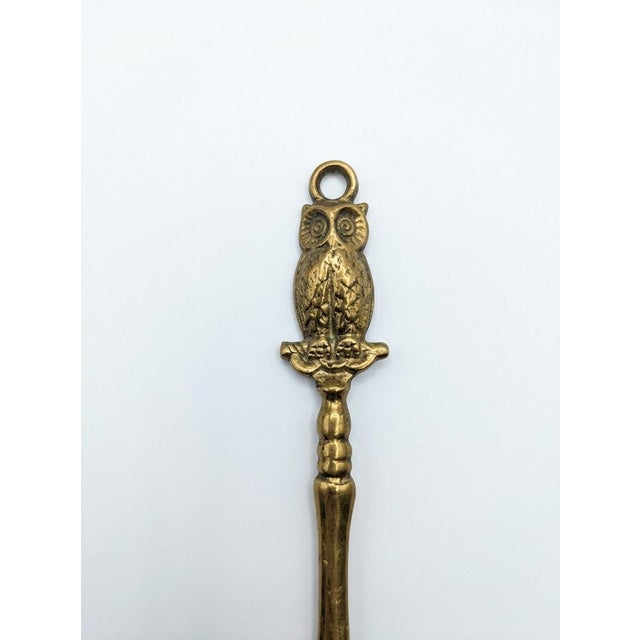 A handsome and classic addition to any home office, study, or gallery bookcase, this vintage solid brass letter opener...