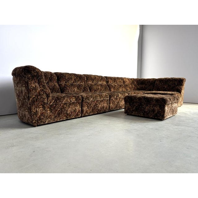 Love it or hate it, this beautiful palm motive fabric modular/sectional sofa by Laauser is a true eye catcher and a great...