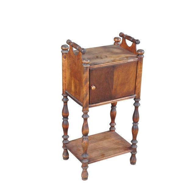 Antique circa 1930s Cushman 130 Humidor smoke stand. Made of mahogany featuring two tiers with lower shelf and upper...