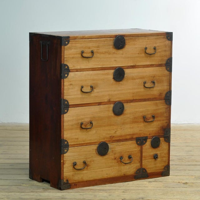 Traditional Japanese Tansu chest of drawers from the 1870s. Manufactured during the late Meiji era (1868-1912). This piece...