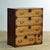 Traditional Japanese Tansu chest of drawers from the 1870s. Manufactured during the late Meiji era (1868-1912). This piece...