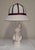 Vintage Italian Table Lamp Depicting a Reading Girl in Stonelite, 2000s, in Very Good conditions. Designed from 2000...