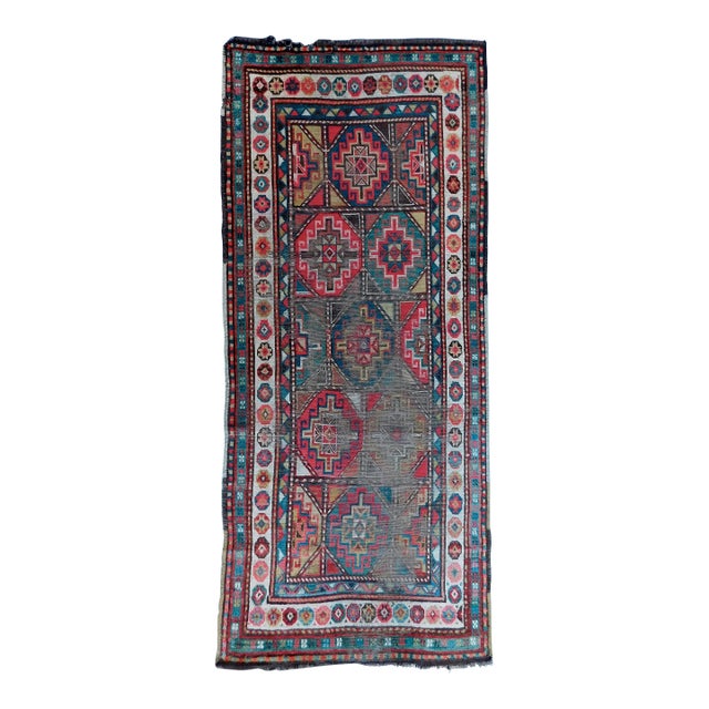 Distressed Antique Caucasian Rug. 3'4"x 7'10'" For Sale