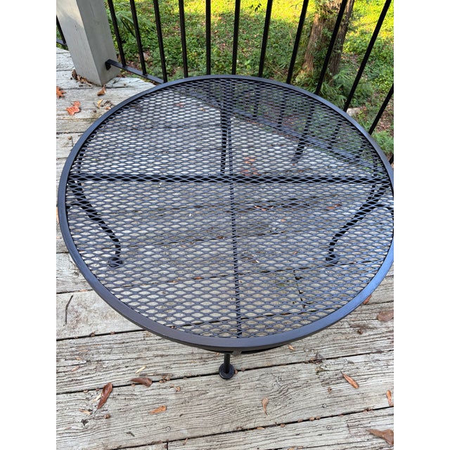 woodard attributed iron mcm coffee table. pairs with vintage or modern iterations within same brand 30 in diameter no...