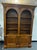 Acanthus carved Birchwood open double bookcase with cabinet storage beneath. Neoclassical style, with ample storage....