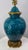A Ormolu-Mounted Chinese style porcelain table lamp has a vibrant Peacock Blue glaze. Porcelain table lamp is Chinoiserie...