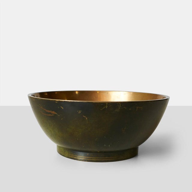 Patinated Bronze Bowl by Krone Bronce Denmark, 1950s A patinated bronze bowl with highly polished interior. Designed and...