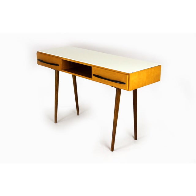 Mid-century writing desk which can also be used as a console table. Manufactured by UP Zavody Bučovice in former...