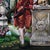 Lust for Life by Claudia Griesbach-Martucci | Oil on board Wolf-headed figure in a garden setting. For Sale - Image 4 of 5