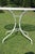 Wrought Iron Patio Set With Dogwood Motifs—Table and Four Armchairs With Covers, 5 Pieces For Sale - Image 13 of 18