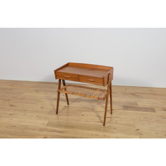 The console table designed by Danish designer Søren Rasmussen in the 1960s. The piece consists of a top with a two drawers...