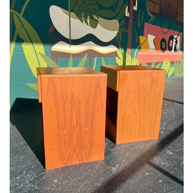 Classic, timeless design in this Danish teak nightstand pair. Clean lines, simple execution, seamless functionality. Can...