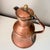 Bring authentic farmhouse warmth to your home with this antique copper hammered ewer. The bell‑shaped silhouette and...