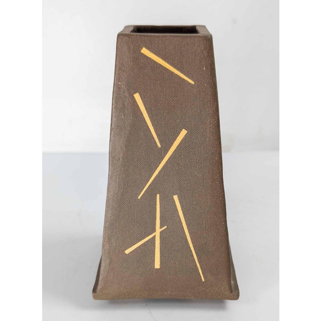 We are selling this great Mid-Century art pottery vase. This vase has great form with simple and elegant resist decoration...