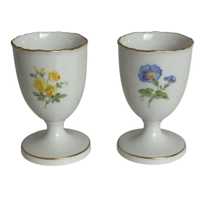 This is a beautiful rare pair of Meissen egg cups. One showcases morning glory’s, and the other, daffodils. These were...