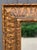 A striking antique-style carved giltwood wall mirror with rich Baroque/Rococo influence. The substantial frame features...