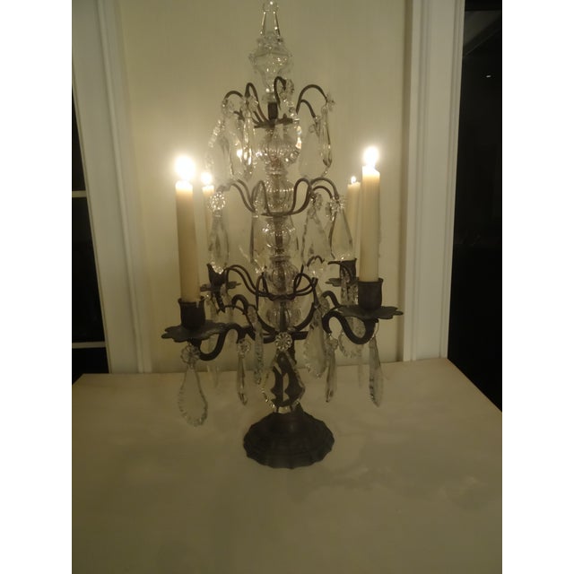 At one time this Girandole was wired for electricity but it has since been converted back to use with candles. It has its...